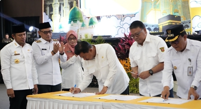 penandatanganan nota kesepahaman yang digelar di Plenary Hall Gelora Kadrie Oening, Samarinda