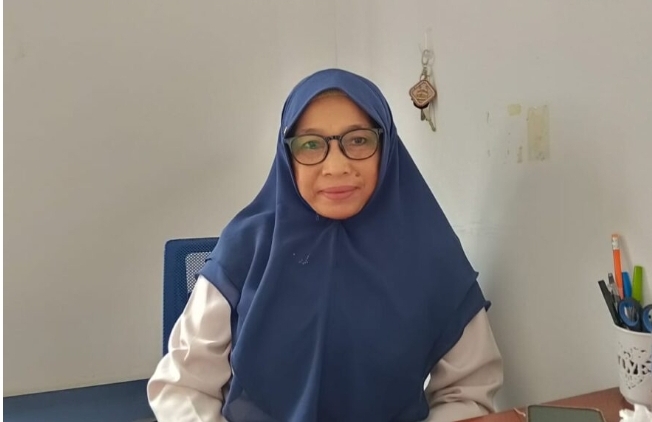 Pelaksana Tugas (Plt) Camat Kembang Janggut Suhartono melalui Kepala Seksi Pelayanan Umum Aslamiah